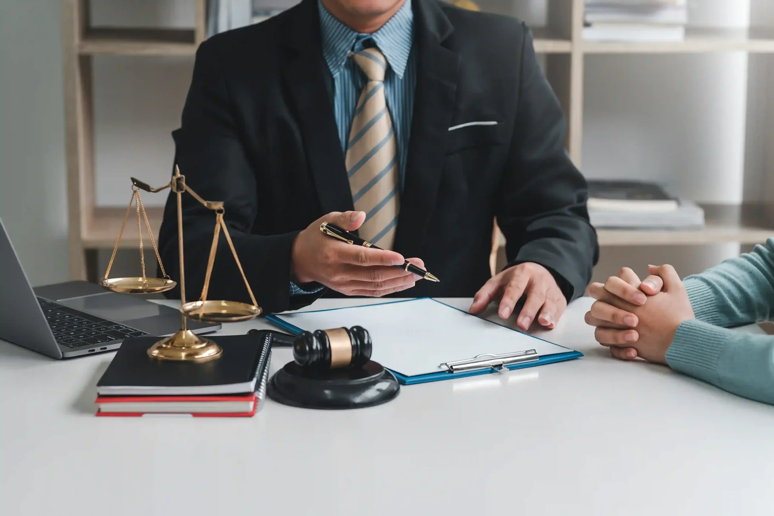 close-up-businessman-lawyer-client-sitting-office-negotiating-together-using-document_11zon